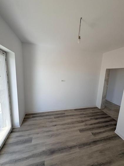 Apartament cu 3 camere semidecomandat, mobilat în Giroc