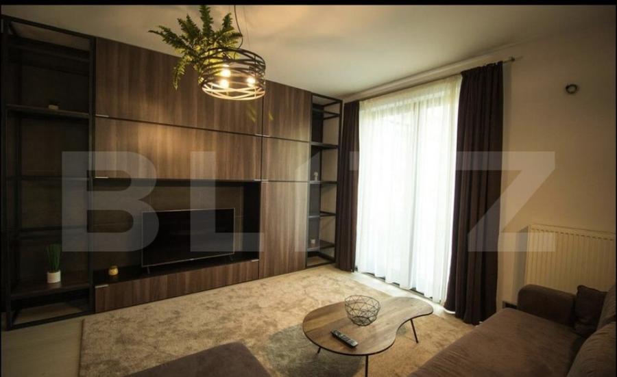 Apartament modern, zona centrala, cu parcare. Ocupabil de la - 4