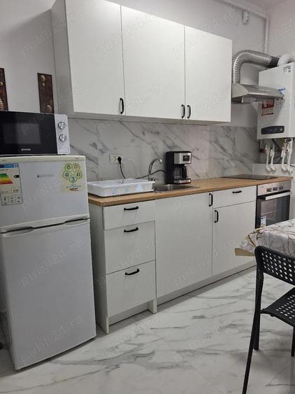 proprietar inchiriez garsoniera cu loc de parcare inclus - 2