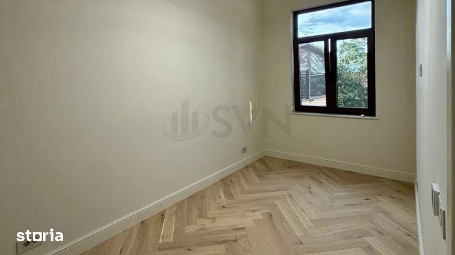 Apartament cu 4 camere în Romană