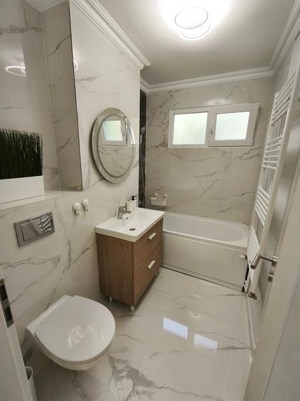 Apartament cu 3 camere semidecomandat în Take Ionescu
