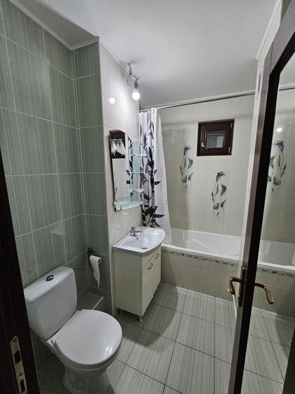 Apartament cu 3 camere decomandat în Budiu Mic