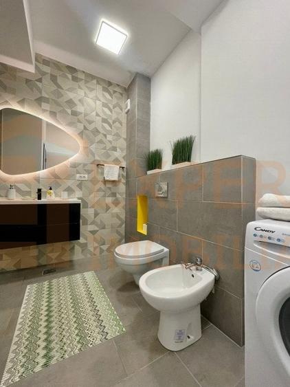 Apartament cu 3 camere semidecomandat, mobilat în Mamaia-Sat