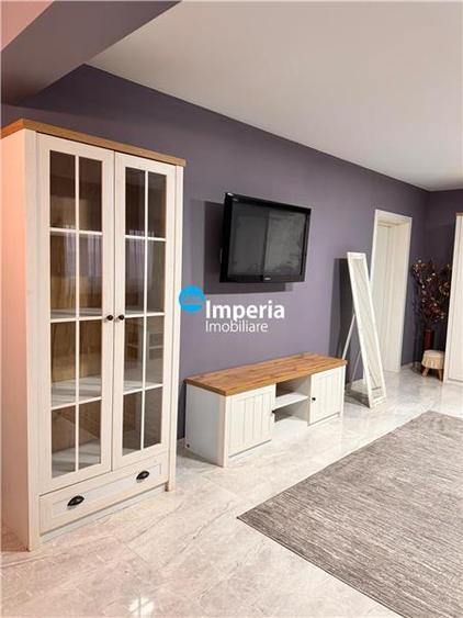 Apartament cu 4 camere decomandat, mobilat în Breazu