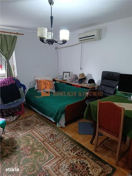 Casă cu 3 camere decomandat cu Teren 418 Mp în Central