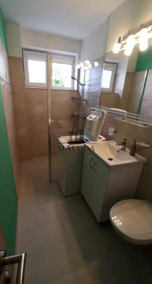 Apartament cu 2 camere semidecomandat, mobilat în Calea București