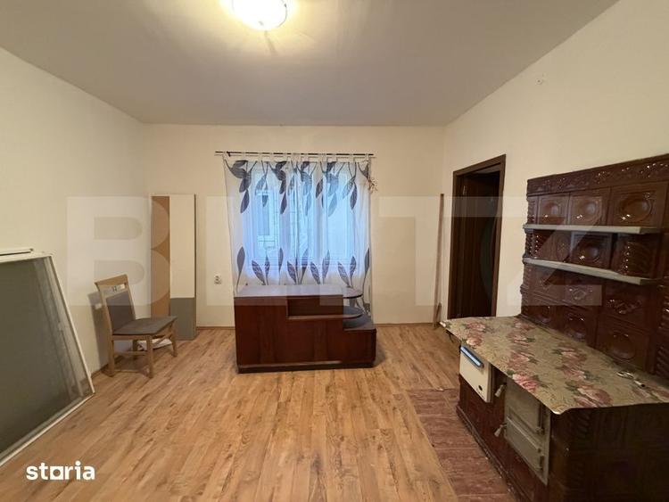 Casă cu 4 camere cu Teren 1000 Mp în Lozna