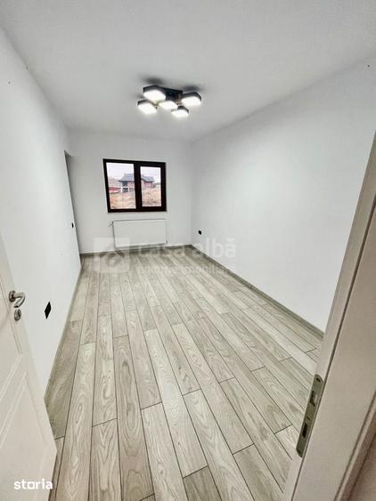 Casă cu 4 camere cu Teren 500 Mp în Bucium