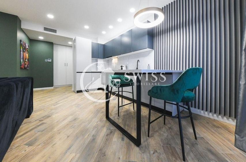 Apartament cu 2 camere semidecomandat, mobilat în Central