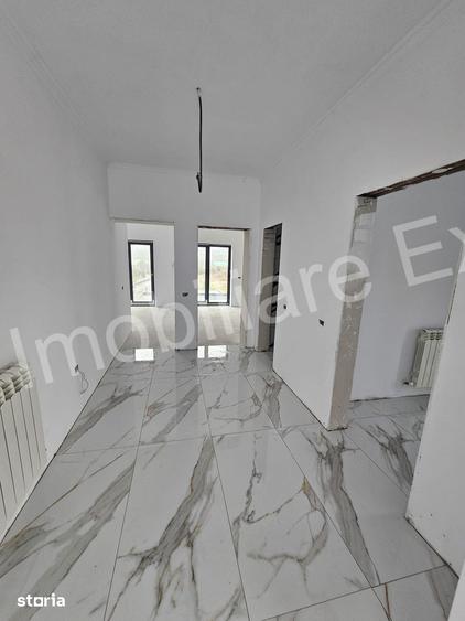 Casă cu 4 camere cu Teren 1000 Mp în Băiculești
