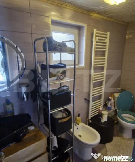 Casă cu 3 camere cu Teren 1000 Mp în Central