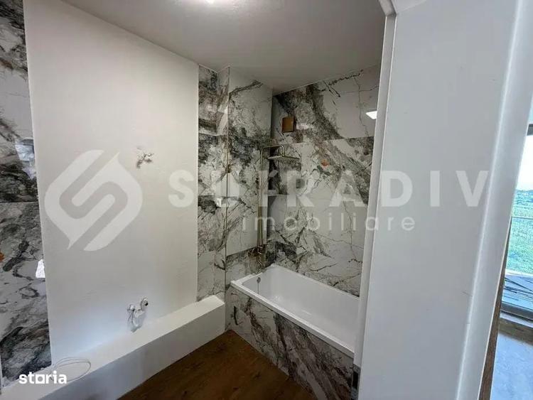 Apartament cu 3 camere semidecomandat în Borhanci