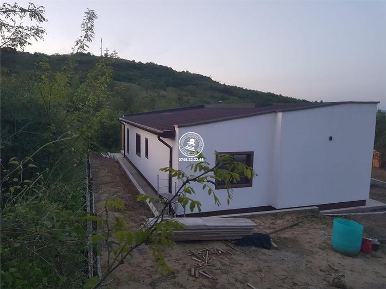 Casă cu 4 camere cu Teren 125.05000305176 Mp în Tomești
