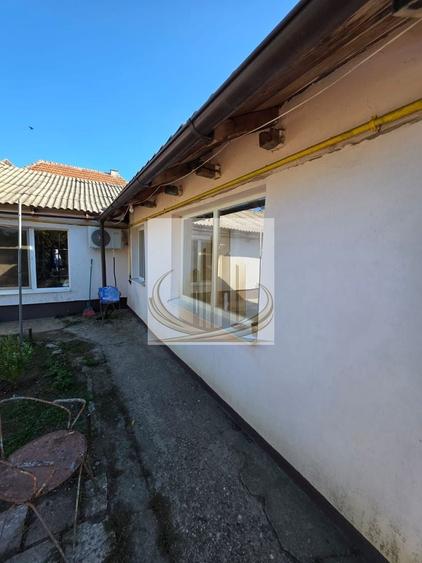 Casă individuală cu 4 camere cu Canalizare în Ronaț