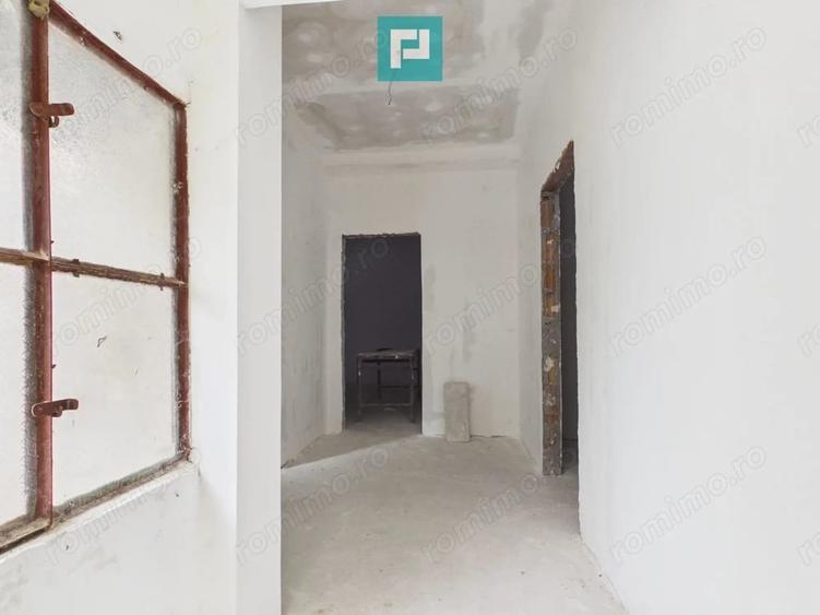 Casă cu 4 camere cu Teren 405 Mp în Romanilor