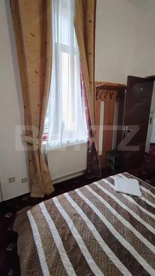 Casă cu 11 camere cu Teren 670 Mp în Clăbucet
