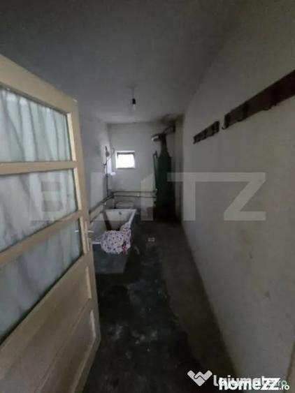 Casă cu 3 camere cu Teren 1500 Mp în Central