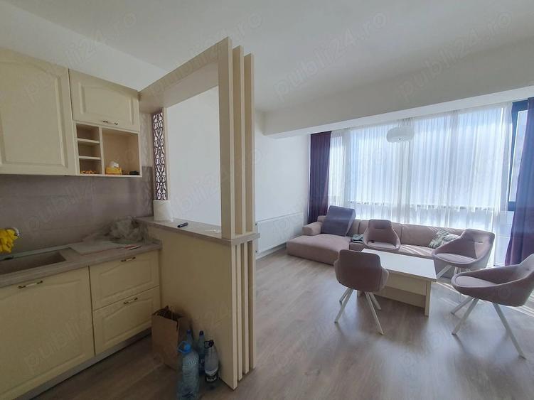 Apartament cu 3 camere decomandat în Titan
