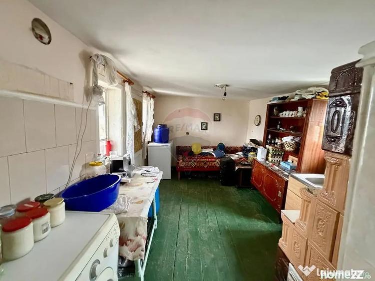 Casă cu 3 camere cu Teren 5000 Mp în Popești