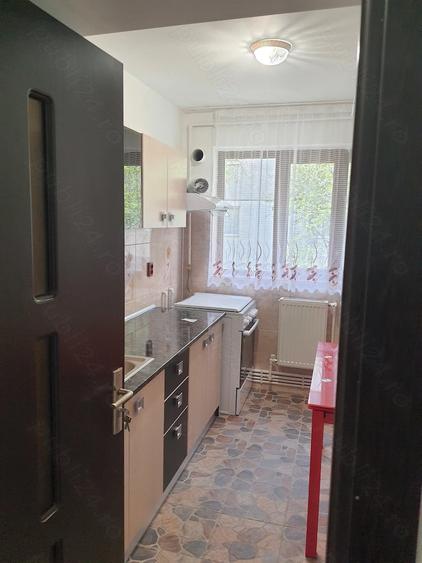 Inchiriez apartament in Campina central 2 camere ,parter,renovat si utilat complet. - 10