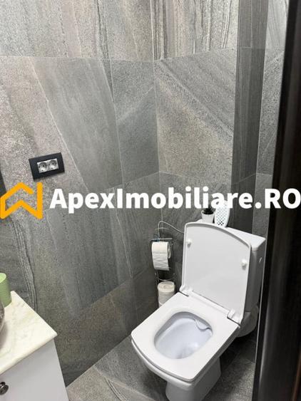 Apartament cu 4 camere decomandat în Titan