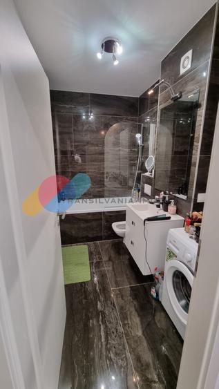 Apartament cu 2 camere semidecomandat, mobilat în Chinteni