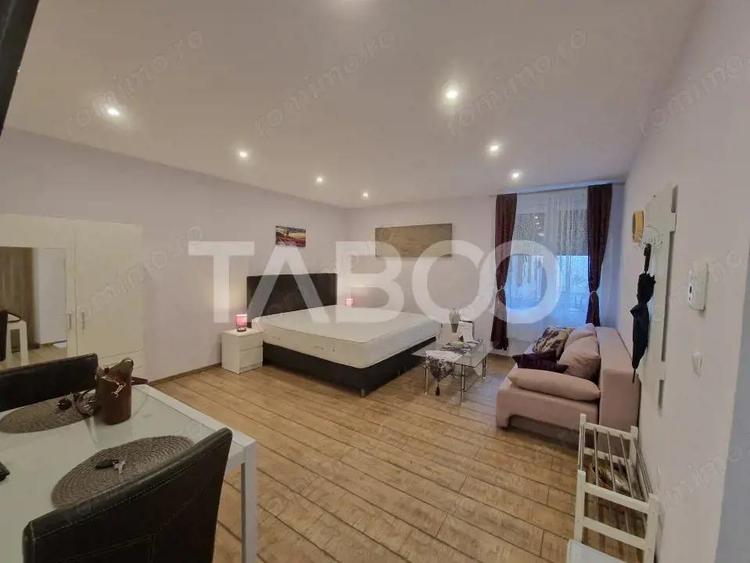 Garsoniera moderna 32mpu de inchiriat in centrul Sibiului - 9