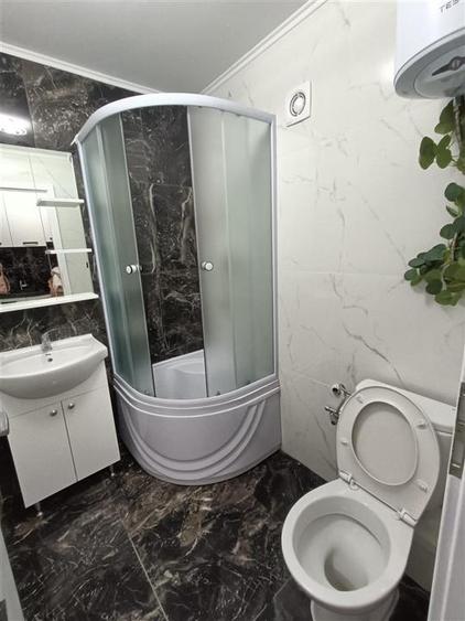 Vanzare garsoniera transformata din camera de camin - 4