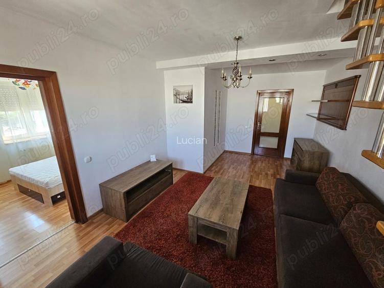Inchiriere apartament 2 camere, central, cu loc de parcare privat