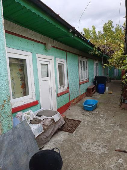 Casă cu Teren 1000 Mp în Central