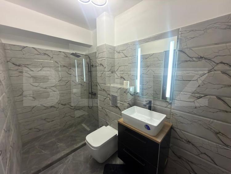 Apartament cu 2 camere semidecomandat, mobilat în Cornitoiu