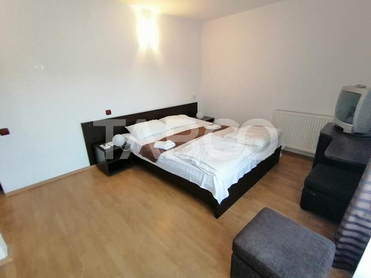 Pensiune 13 camere 16 bai sauna piscina si teren 1565 mp Cisnadioara - 15