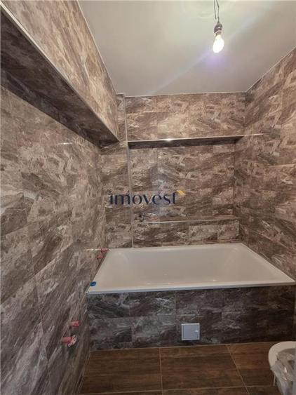 Apartament cu 4 camere decomandat în Carpați 2