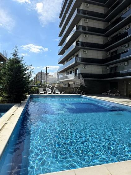 Apartament modern cu balcon generos si acces la piscina - 1