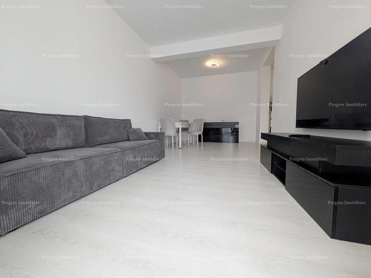 Ap.2 camere - mobilat si utilat - 55mp - bloc cu lift - 370 Euro - parcare inclusa - 4