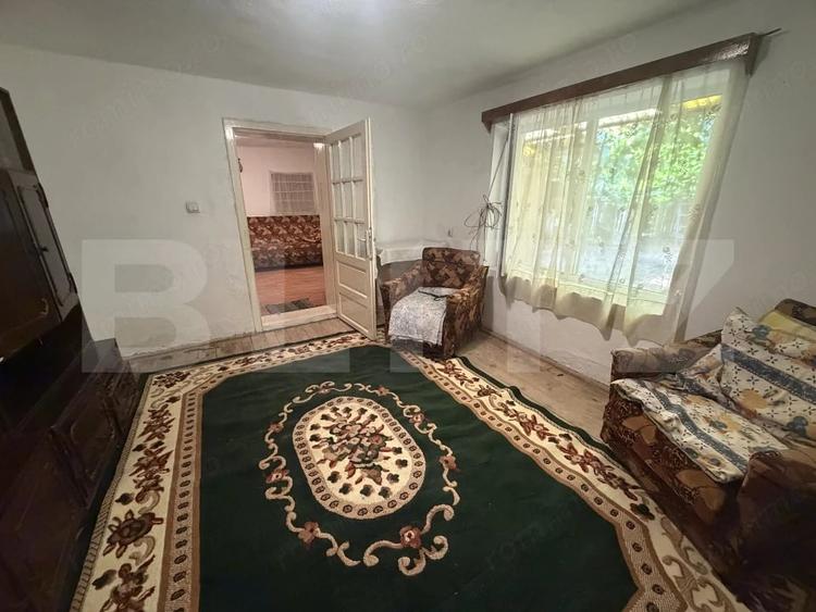 Casă cu 2 camere cu Teren 1400 Mp în Nușfalău