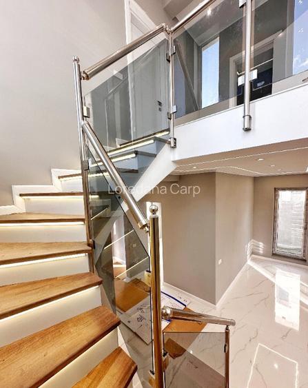 Vila individuala P+1E - 4 camere - 3 bai - teren 400mp - beci