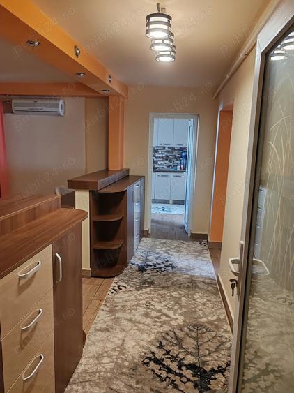 Ofer spre inchiriere apartament cu trei camere confort 1 - 9