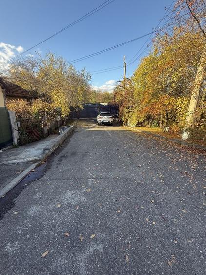 2 corpuri de Casă renovate + teren 125 mp Campina - 31