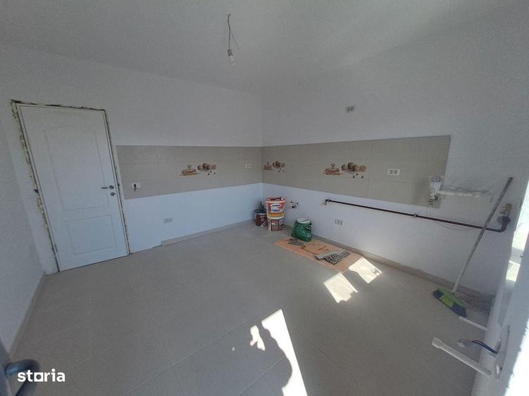 Casa noua cu mansarda, 650mp teren, Voinesti-pret 112000 euro - 6