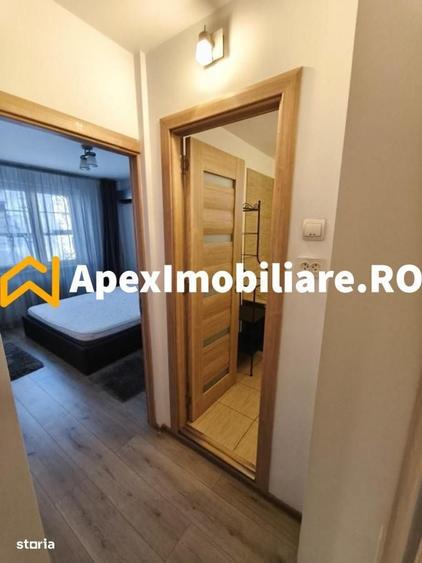 Apartament cu 3 camere semidecomandat în Costin Georgian
