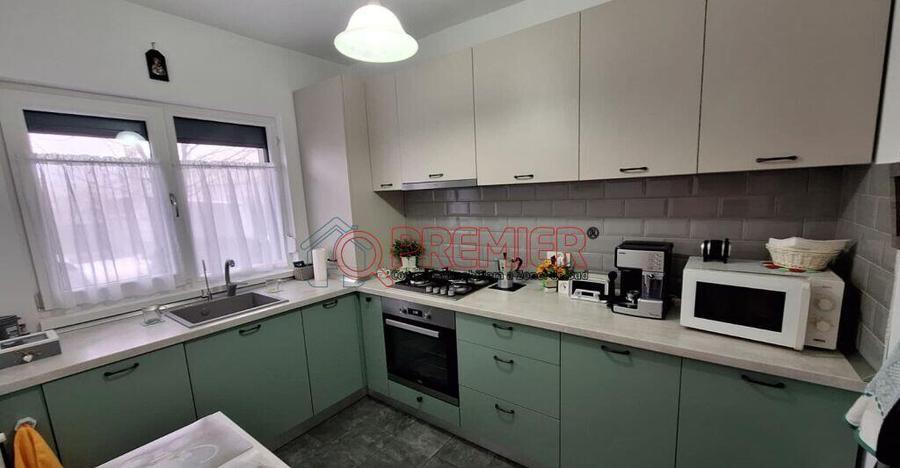 Casa in?iruita P+1+M - 4 camere - 2 terase - curte - 11