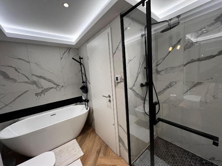 Centrul Civic - apartament 2 camere - balcon 12 mp - loc de parcare subteran - C - 7