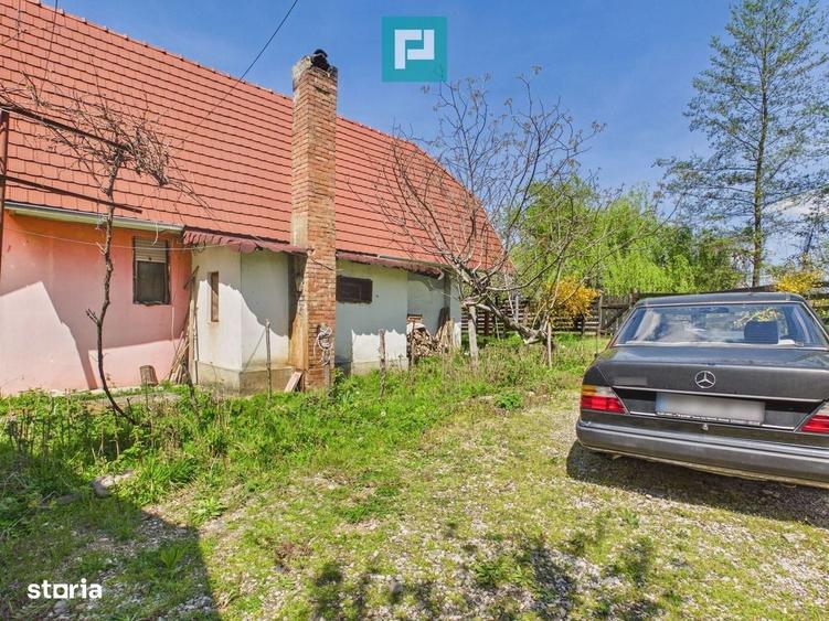 Casă cu 4 camere în Rontău