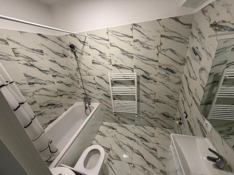 Casă individuală cu 4 camere cu Canalizare în Tunari