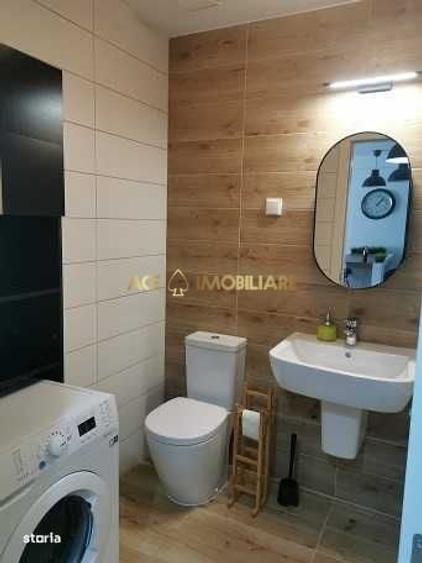 Apartament cu 2 camere semidecomandat, mobilat în Costin Georgian