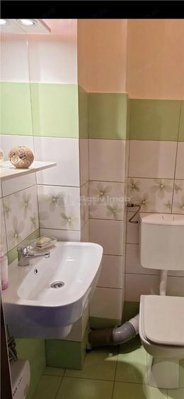 Apartament cu 3 camere decomandat în Calea București