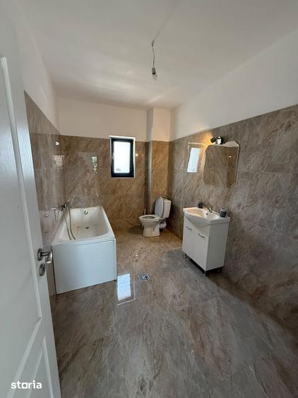 Casă cu 4 camere cu Teren 250 Mp în Cornetu