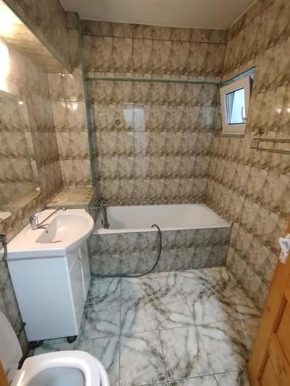 Apartament cu 4 camere decomandat în Răcădău