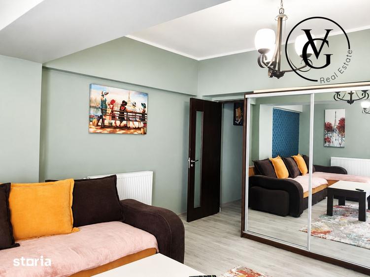 Apartament cu 2 camere semidecomandat, mobilat în Central